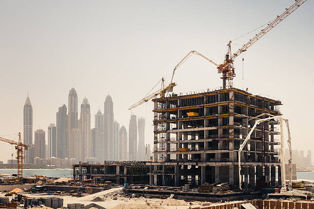 New construction work in Dubai. Marina Dubai district in the background